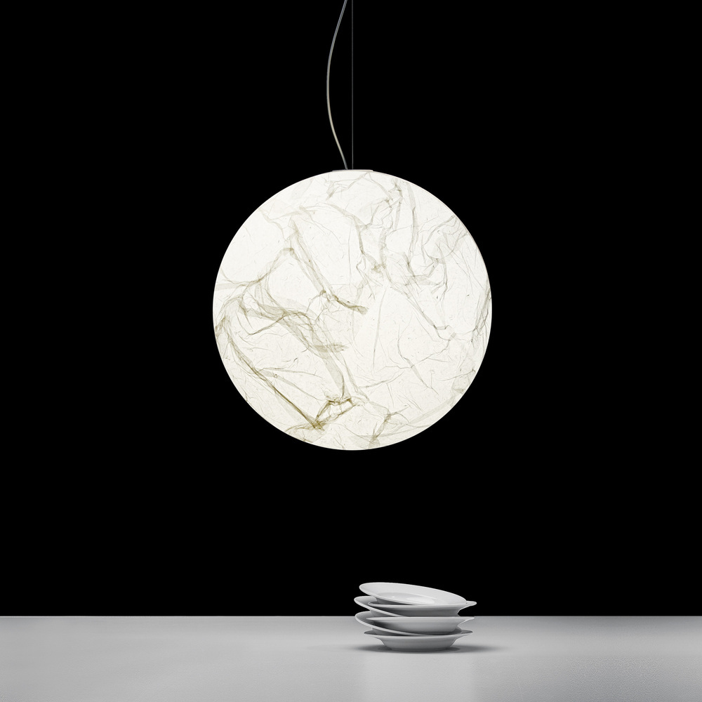 Davide Groppi MOON pendant above a table